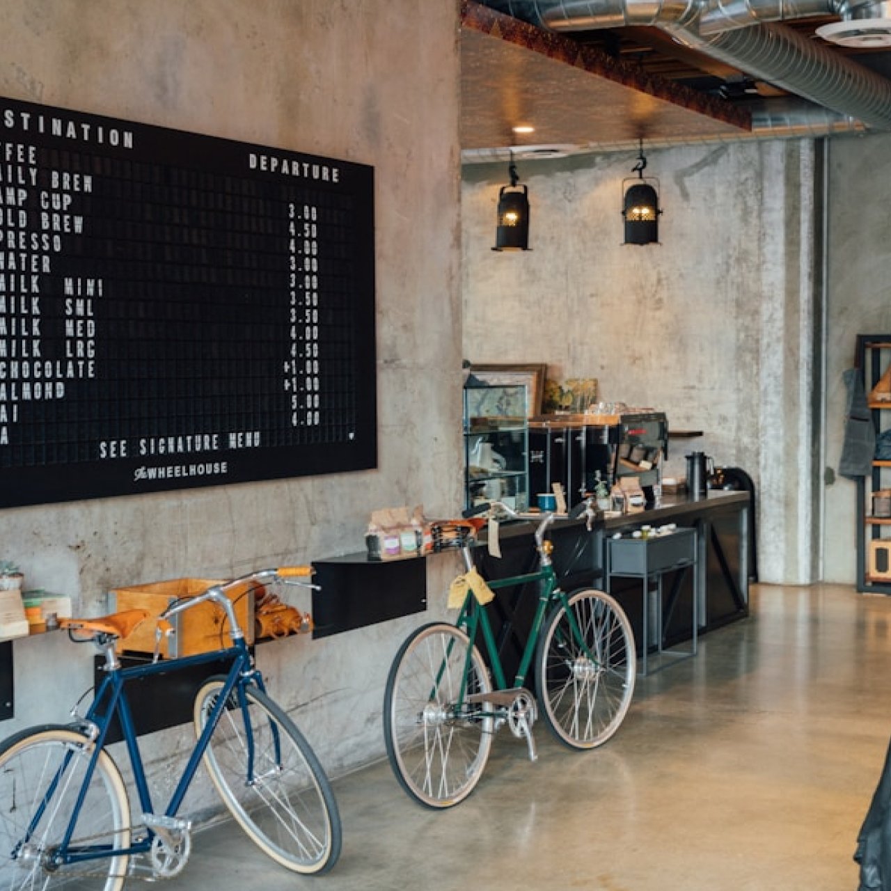 Interior of Cliché Café showing cozy seating and coffee service
